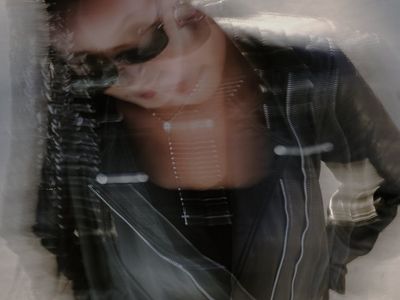 Abstract motion blur of hands during exercise movement.